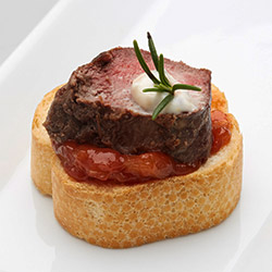 Crostini with herb crusted lamb medallion and rosemary and garlic aioli - mini thumbnail