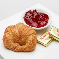 Croissant with jam and butter thumbnail